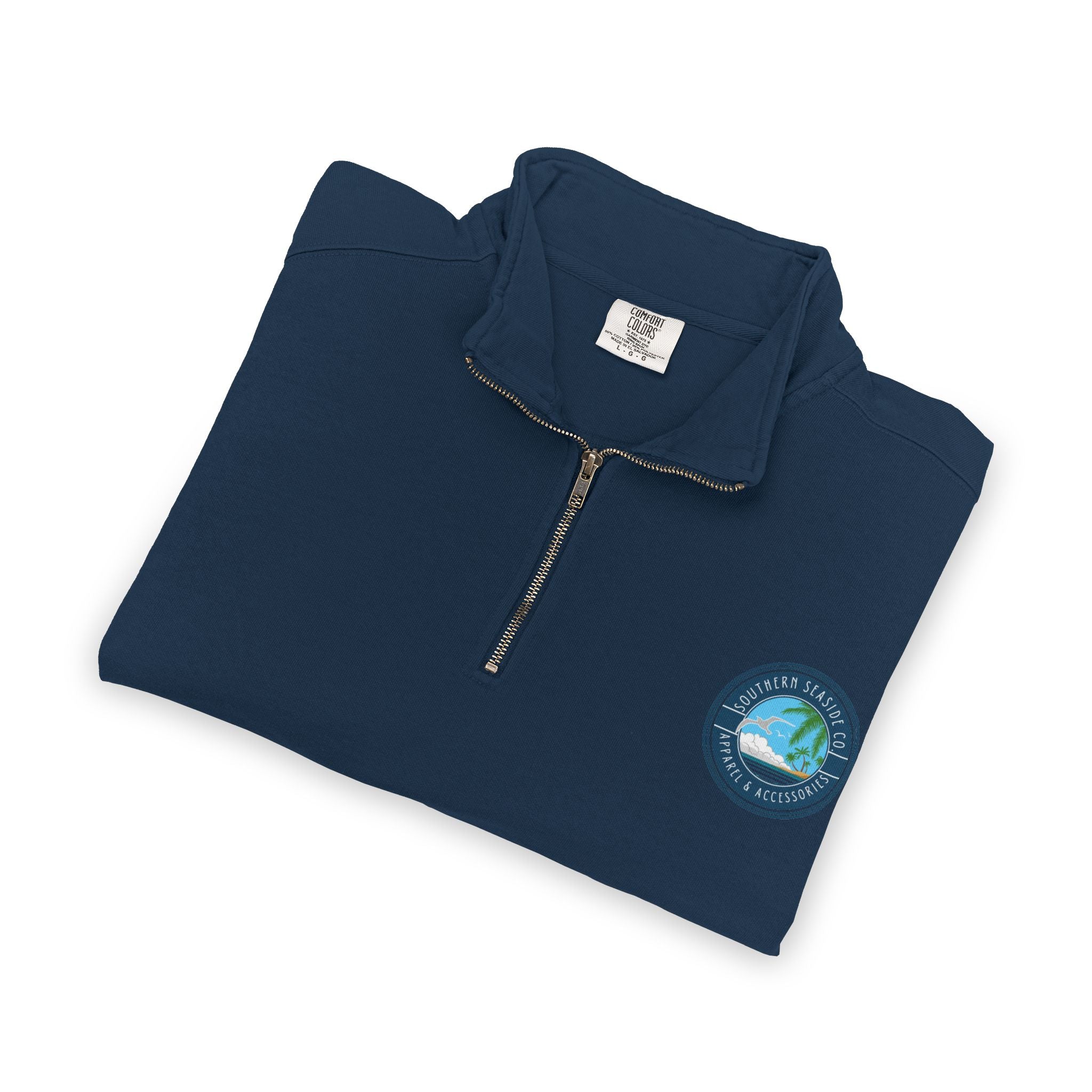 Folded navy blue Comfort Colors Quarter Zip Sweatshirt with a Southern Seaside Company logo on a white background