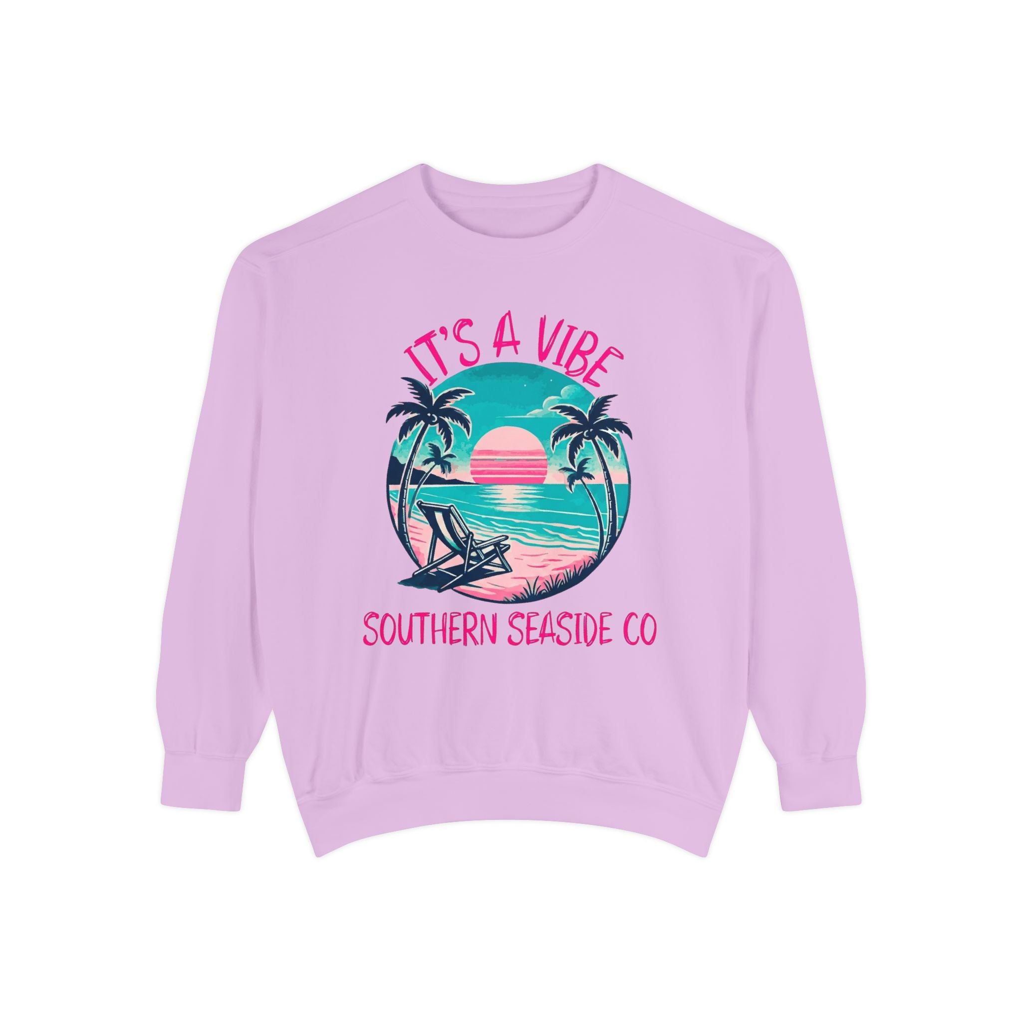 Lavender sweatshirt with a tropical beach sunset graphic and text It's A Vibe Southern Seaside Co 