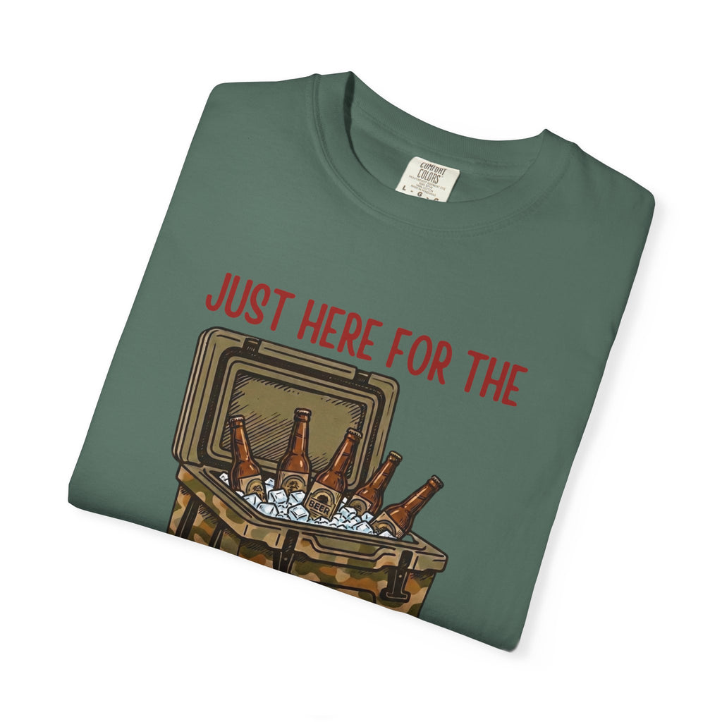 Folded green t-shirt with a graphic of a cooler and text 'Just Here for the' on a white background