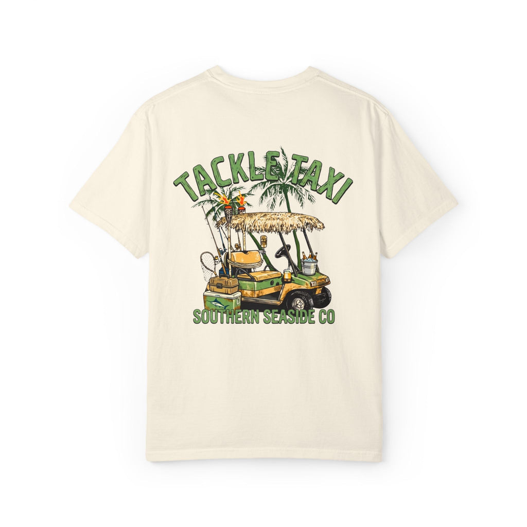 Ivory t-shirt with 'Tackle Taxi' graphic design of a golf cart and 'Southern Seaside Co' logo text on a white background