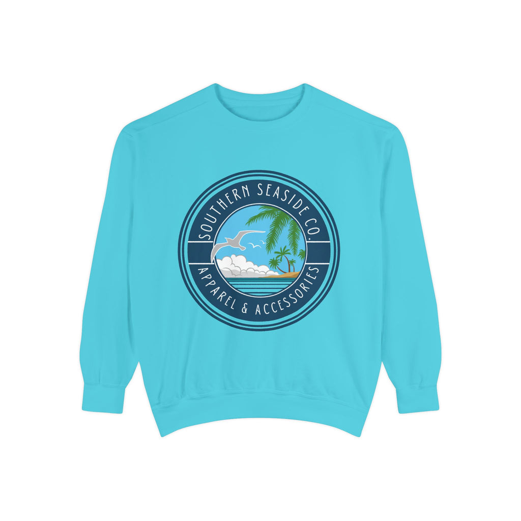 Light blue sweatshirt with a Southern Seaside logo featuring a beach scene on a white background