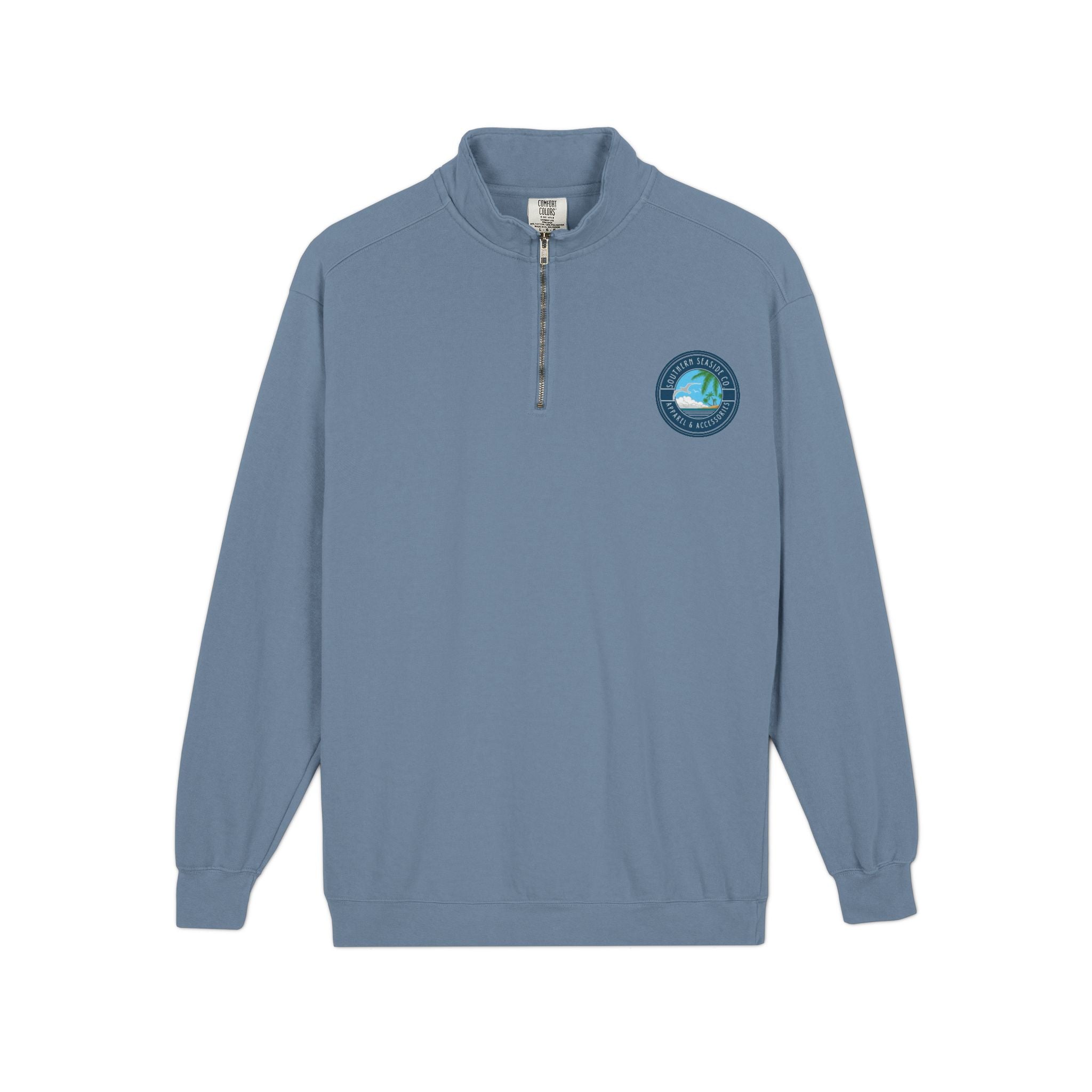 Blue pullover Comfort Colors Quarter zip Sweatshirt with a Southern Seaside logo on the chest against a white background