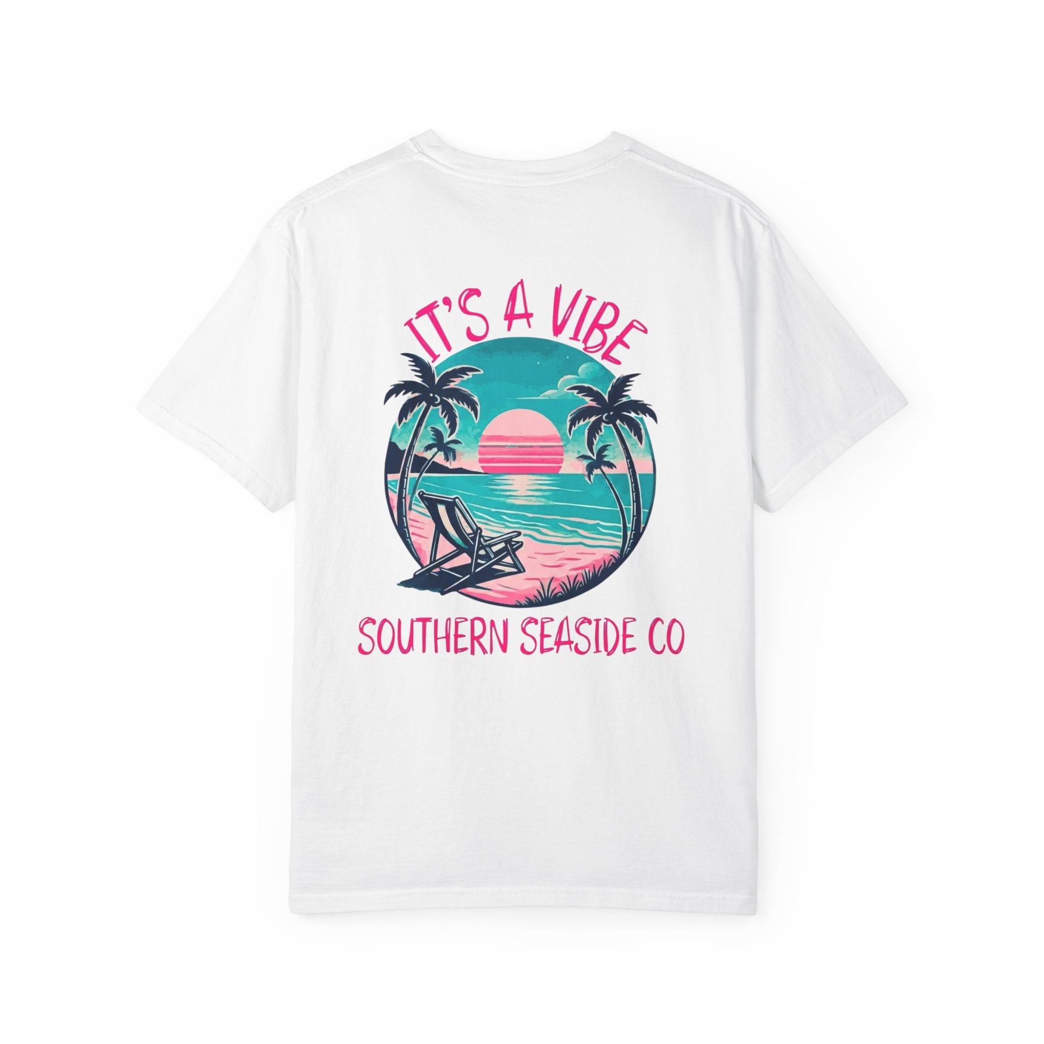 White t-shirt with a tropical graphic and 'It's a Vibe' text on a white background
