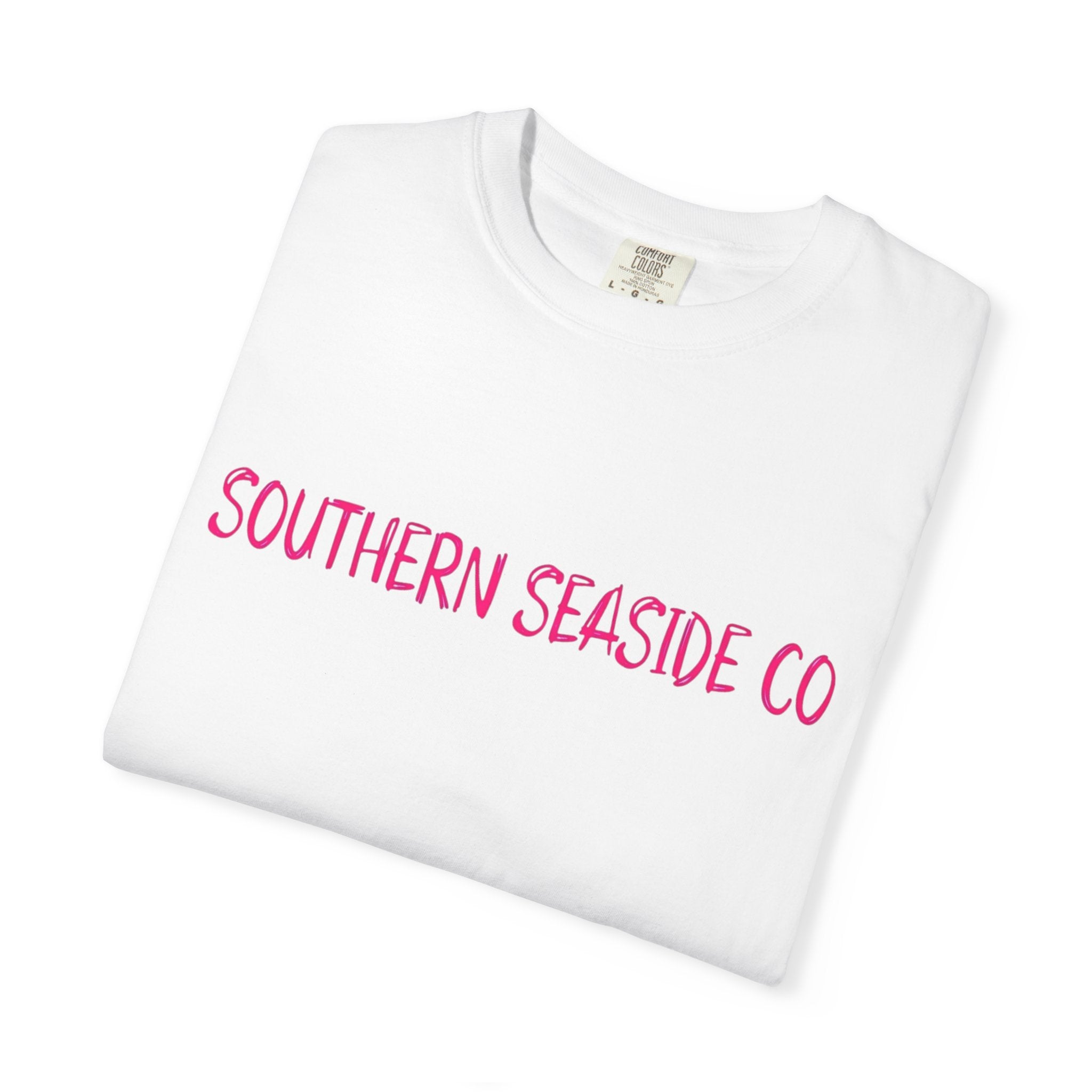 White t-shirt with pink text 'SOUTHERN SEASIDE CO' on a white background
