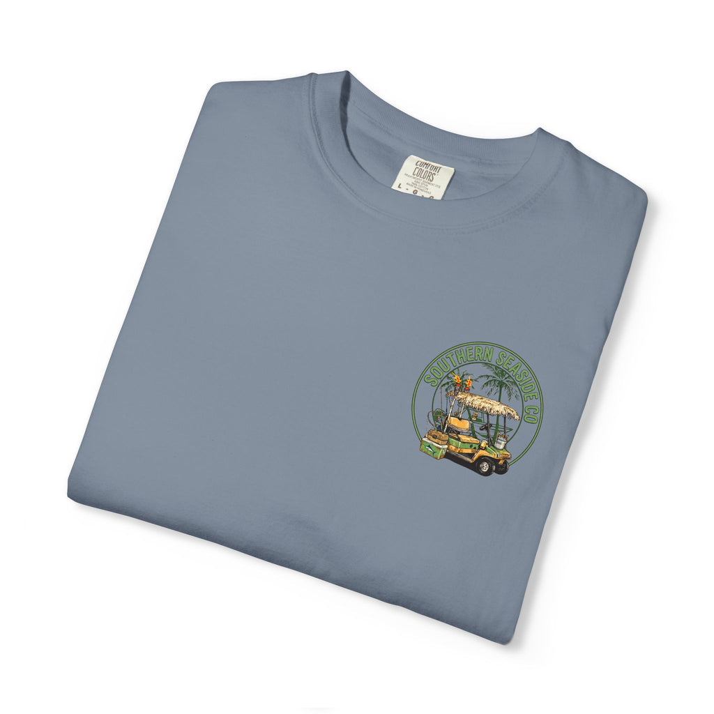 Folded blue t-shirt with a  golf cart and fishing graphic design on a white background