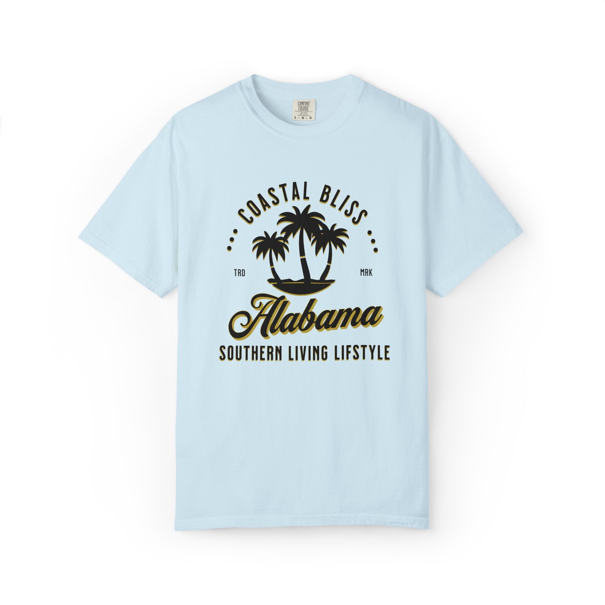 Light blue t-shirt with 'Coastal Bliss Alabama Southern Living Lifestyle' text and palm tree design on a white background