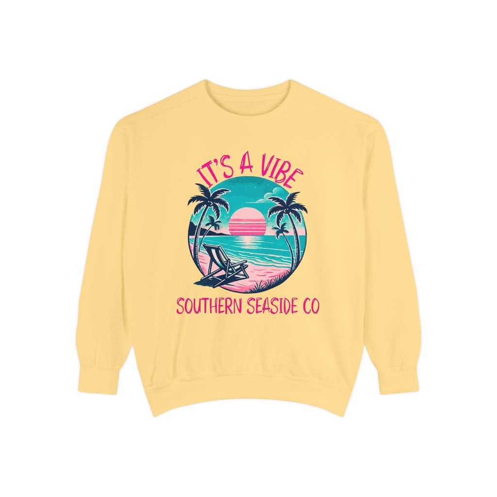 Yellow sweatshirt with a tropical beach design graphic and It's A Vibe Southern Seaside Co text 