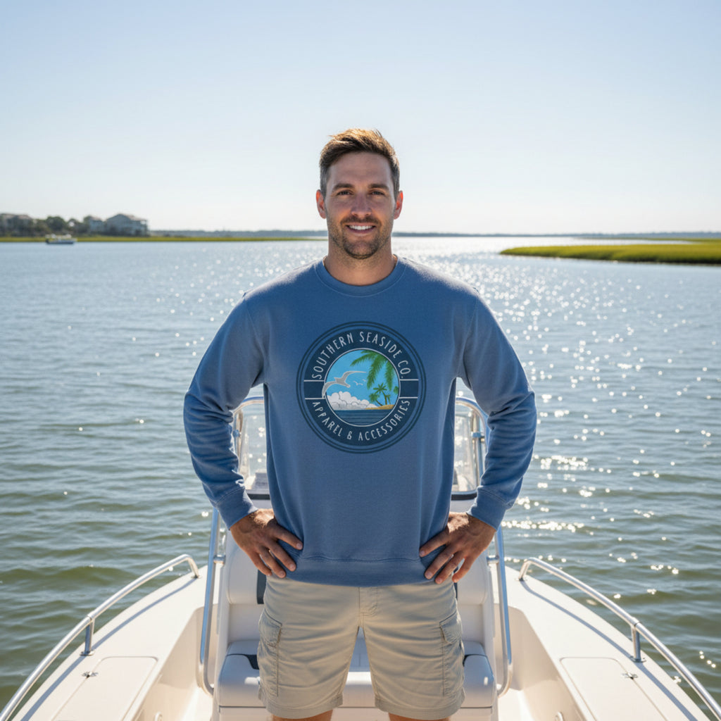 Man wearing a blue sweatshirt with a Southern Seaside Co logo 