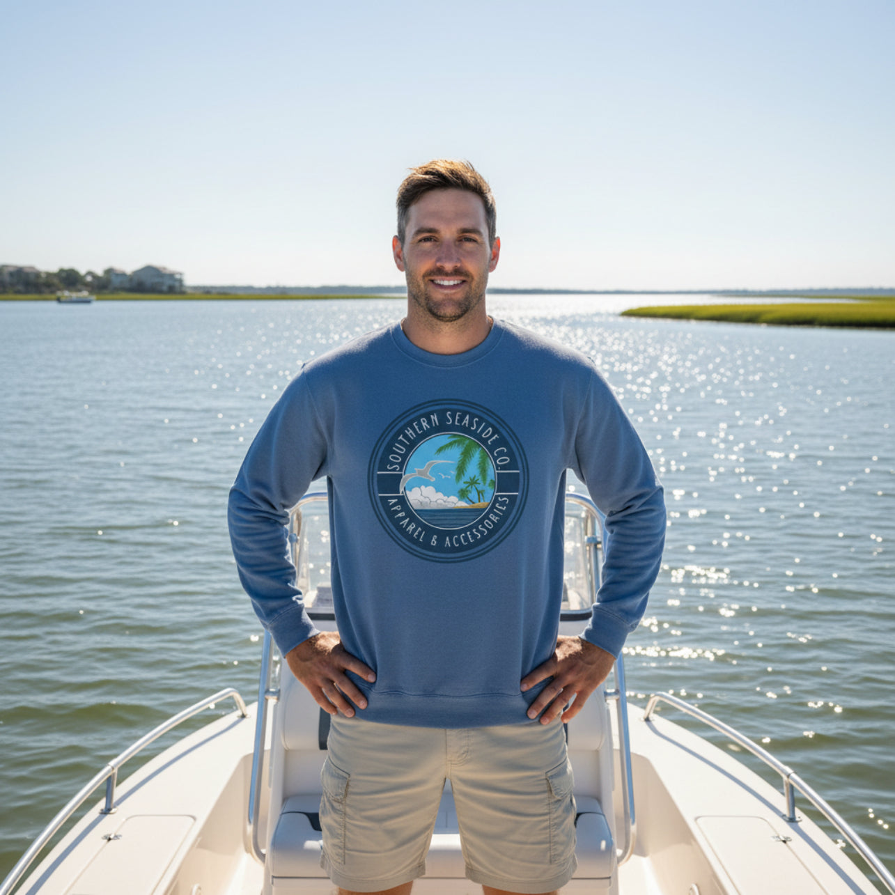 Man wearing a blue sweatshirt with a Southern Seaside Co logo 