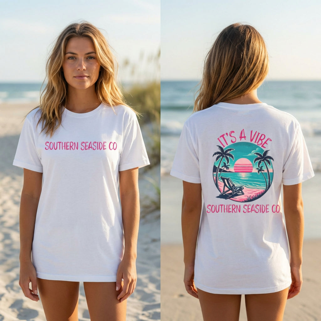 Woman wearing a white t-shirt with 'Southern Seaside Co' branding on a beach.