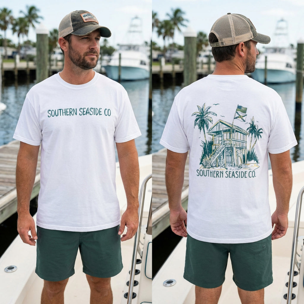 Man wearing a white t-shirt with 'Southern Seaside Co' branding, standing on a boat.