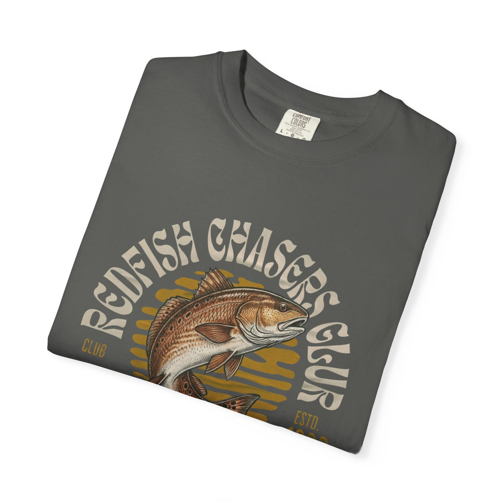 Folded gray t-shirt with redfish graphic and 'Redfish Chasers Club' text on a white background
