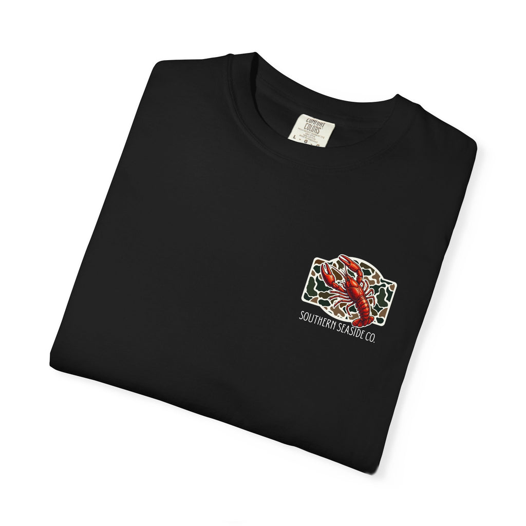 Folded black t-shirt with a crawfish graphic design
