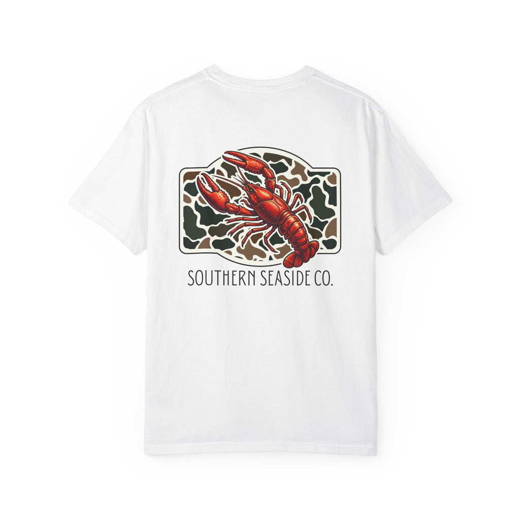 White t-shirt with a crawfish graphic and 'Southern Seaside Co.' text on a new camo print background