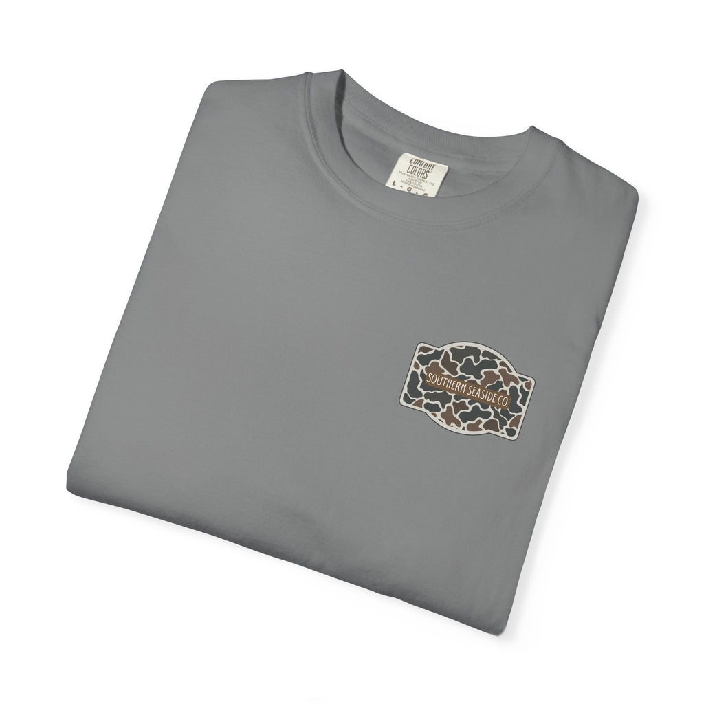 Folded gray t-shirt with a  Southern Seaside Co camouflage logo on a white background