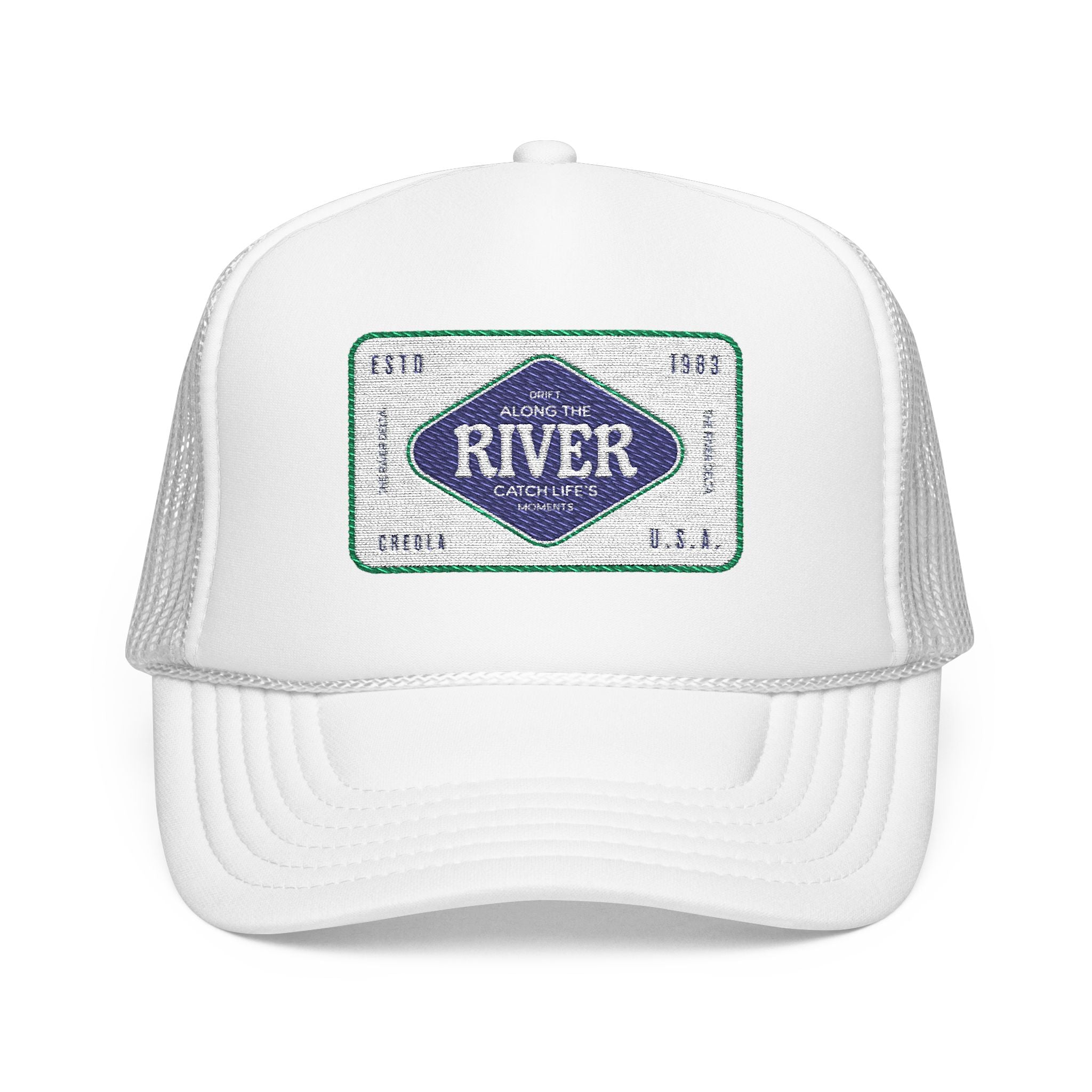 White trucker cap with a decorative patch featuring the a design as a tribute to the establishment on the river delta in Creola Alabama